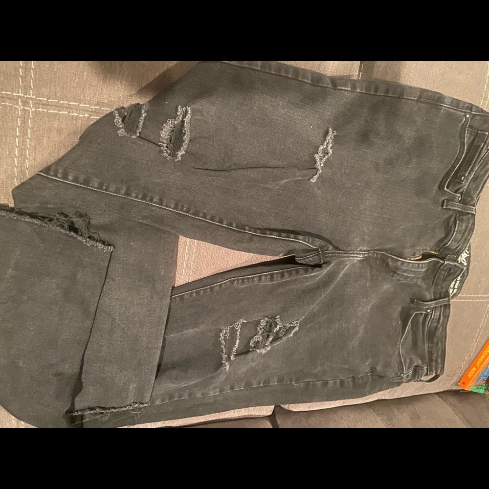 Women’s distressed jeans.